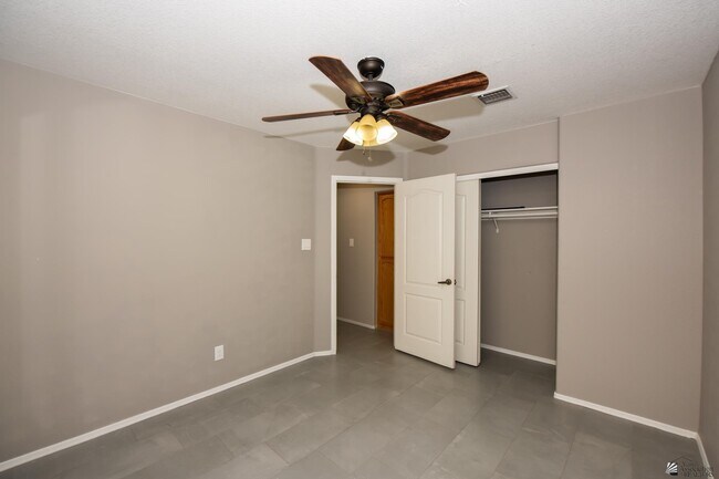 Building Photo - 8215 Forget Me not St