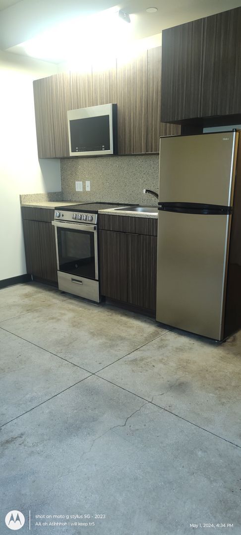 Building Photo - A/C Studio Utilities Included