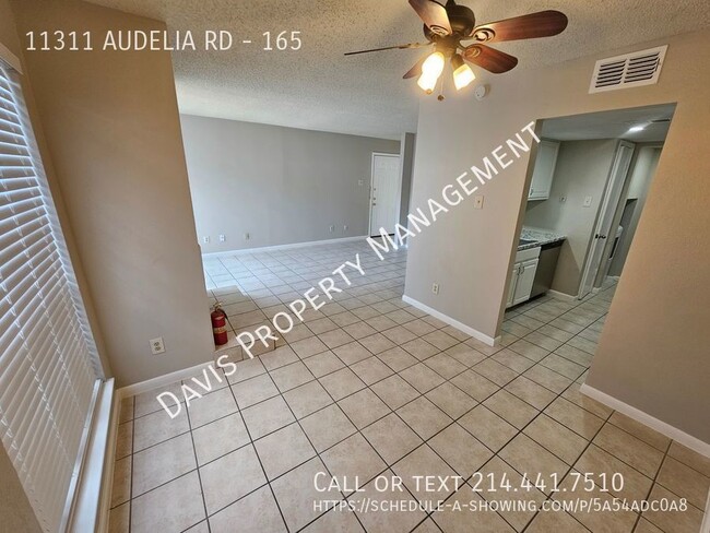 Building Photo - 2 story condo, cov parking, patio, full wa...