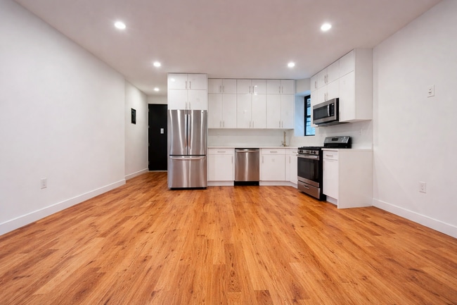 Building Photo - 77 E 119th St