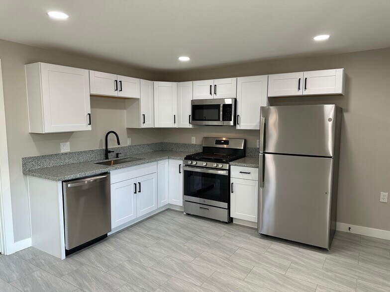 All new stainless steel appliances - 1331 W Speedway Blvd