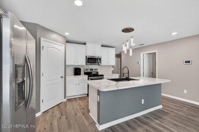 Building Photo - 9099 Tahoe Ln