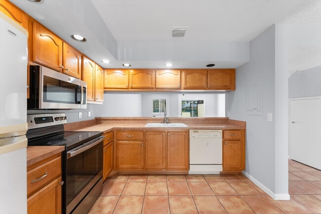 Building Photo - 6175 Riverwalk Ln