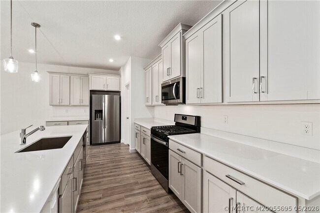 Building Photo - 14143 SW Safi Ter