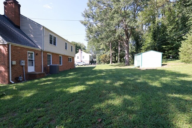 Building Photo - Incredible 2 story in West End with huge wraparound lawn