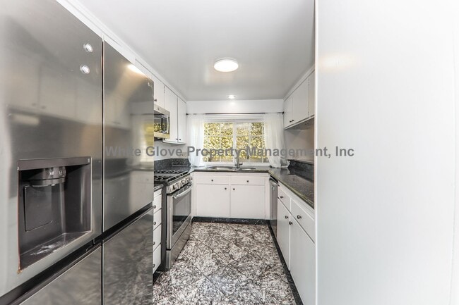 Building Photo - Spacious 4-Bedroom Tustin Home with Solar, Citrus Trees & Gas Fireplace