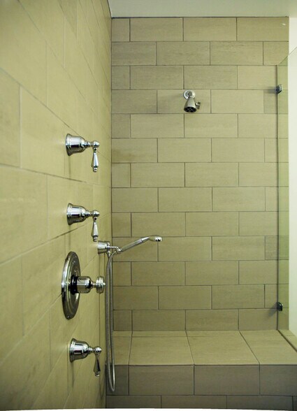 three shower heads - 455 N Spaulding Ave