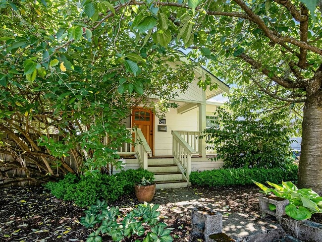 Building Photo - Adorable, vintage 1924 2-bdrm/1-bath w/ fenced yard, raised beds, & chicken house—Great location ...