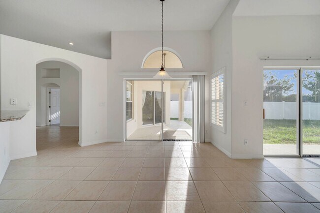 Building Photo - Stunning 4/3 with Fence Enclosed Yard in t...