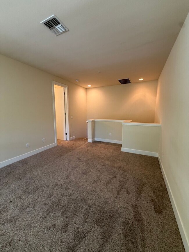 Building Photo - 7034-7046 Santero Way Lofts