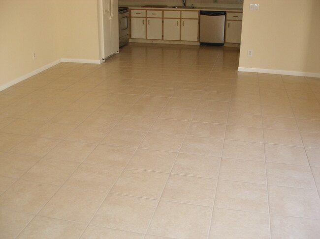 living room looking toward kitchen - 115 Bent Arrow Dr