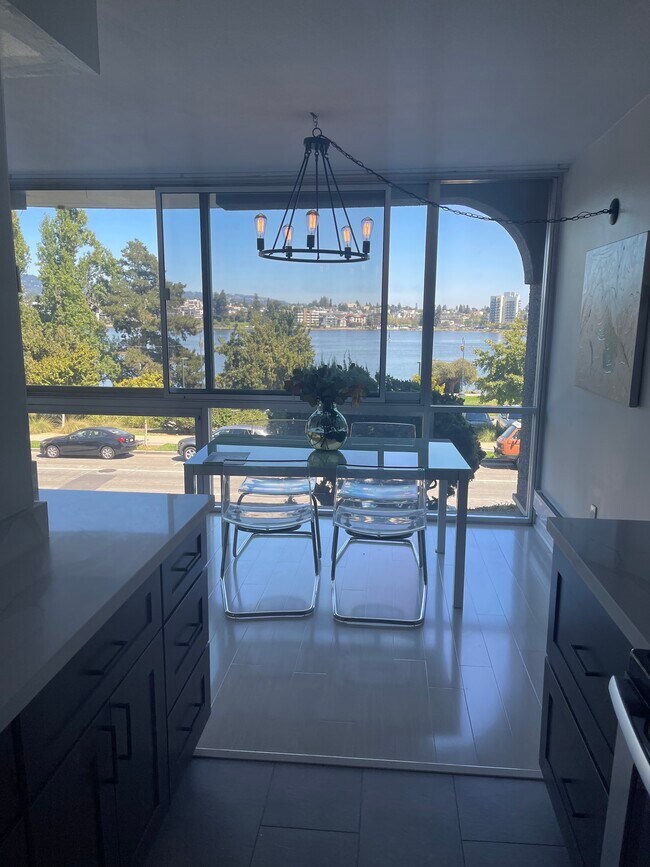 View of lake from dining area and kitchen - 1555 Lakeside Dr