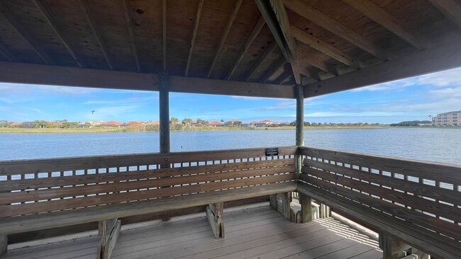 Building Photo - Elevated Luxury at The Terraces – 4th Floor Lake & Golf Course Views! 55+ Community!