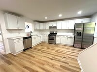 Building Photo - 6174 Poketa Rd