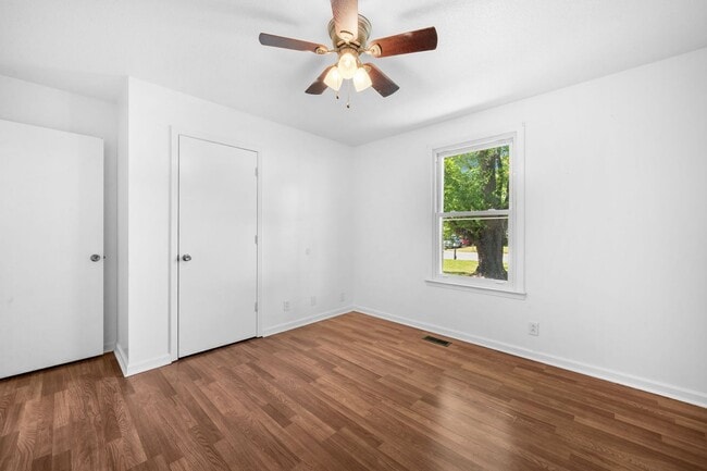 Building Photo - Spacious Yard + Fresh Interior Updates!