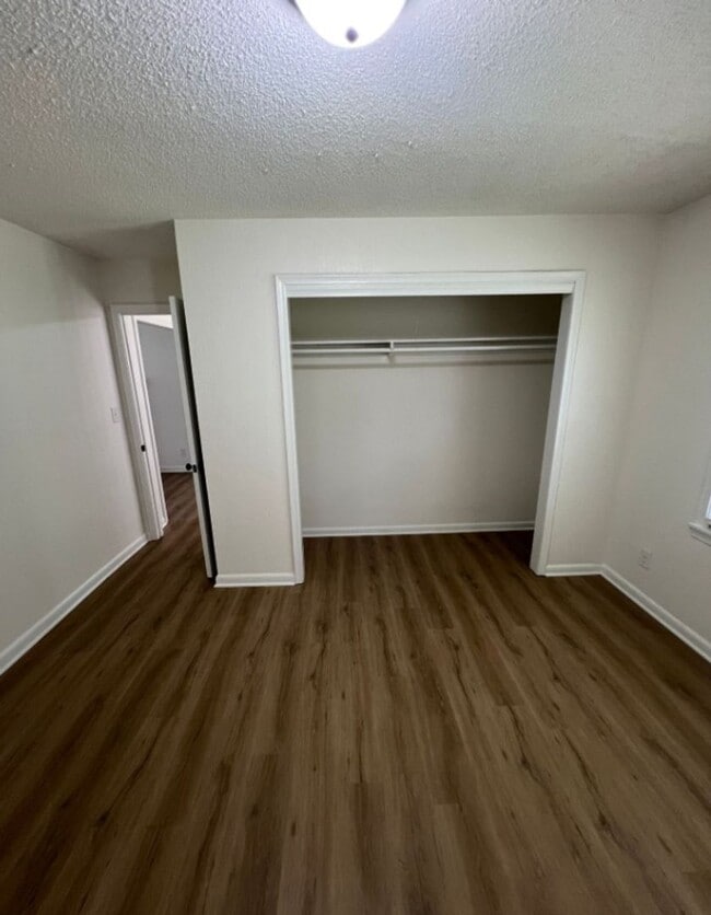 Building Photo - Spacious 4-Bedroom Home with Finished Base...