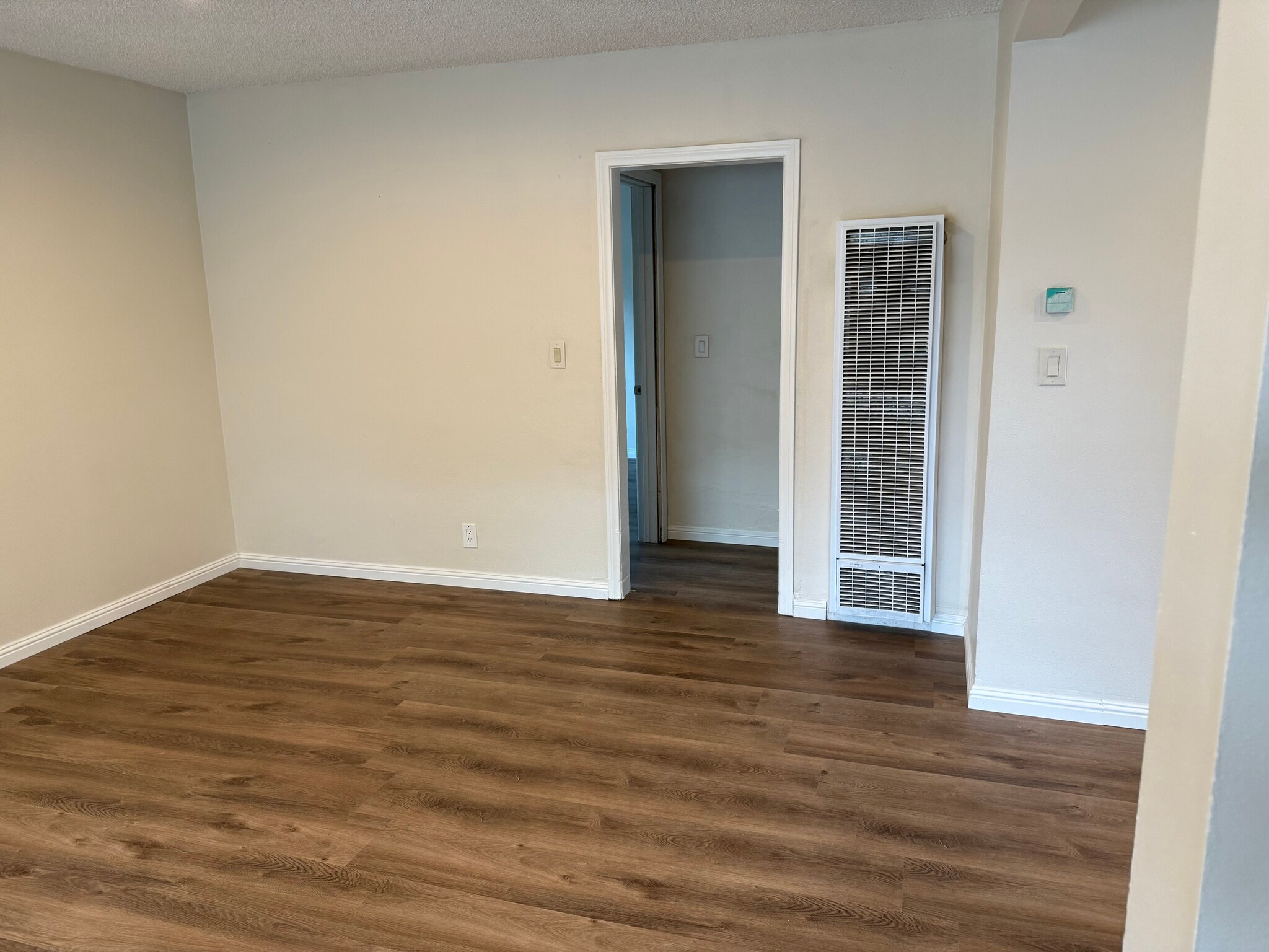 Hall leading to bedrooms and bathroom - 14028 Doty Ave
