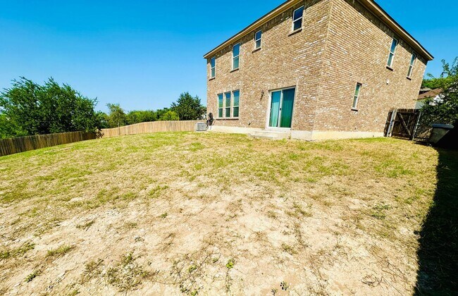 Building Photo - Your Dream Awaits! A Charming 4 bedroom 2....