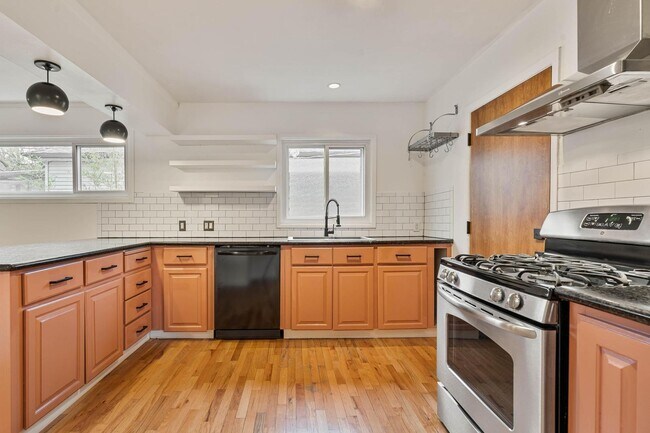 Building Photo - Beautiful, modern 4-bdrm/2-bath home in Concordia—Private, urban sanctuary w/ flex spaces