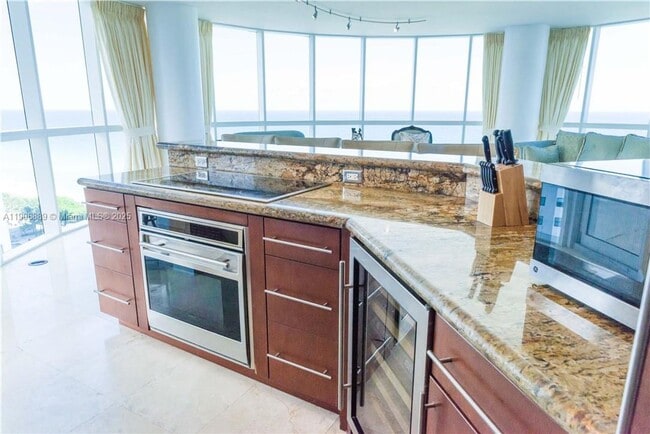 Building Photo - 6301 Collins Ave