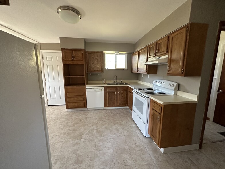 Kitchen with updated appliances - 6120 Pinedale Dr