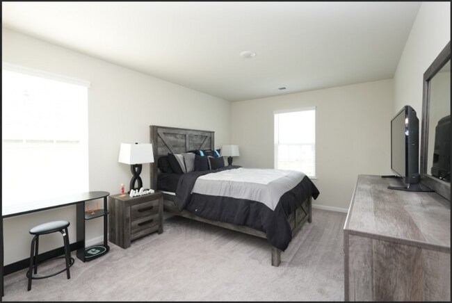 Building Photo - Spacious 4-Bedroom Home with Modern Comforts