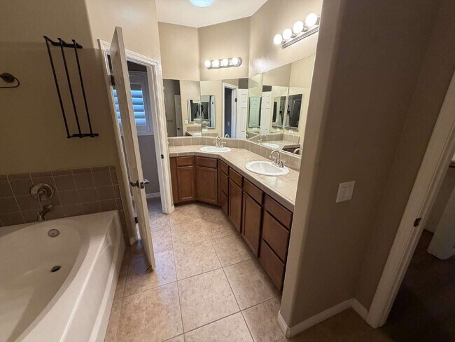 Building Photo - 3 Bedroom, 2 Bathroom Home with Spacious Open Floor Plan & RV Parking