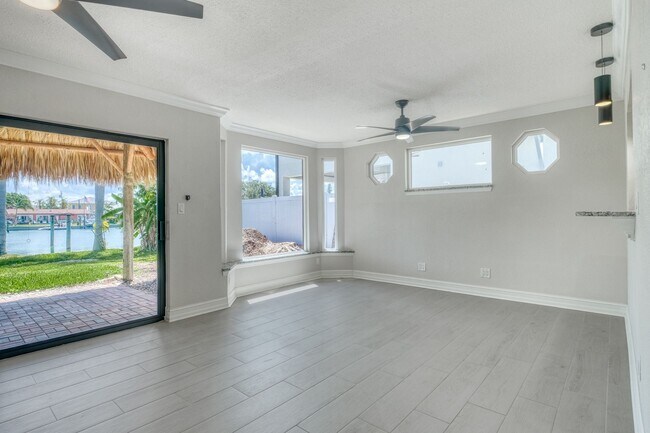 Building Photo - Treasure Island Three Bedroom, Two Bath Furnished Single Family Home on the water.
