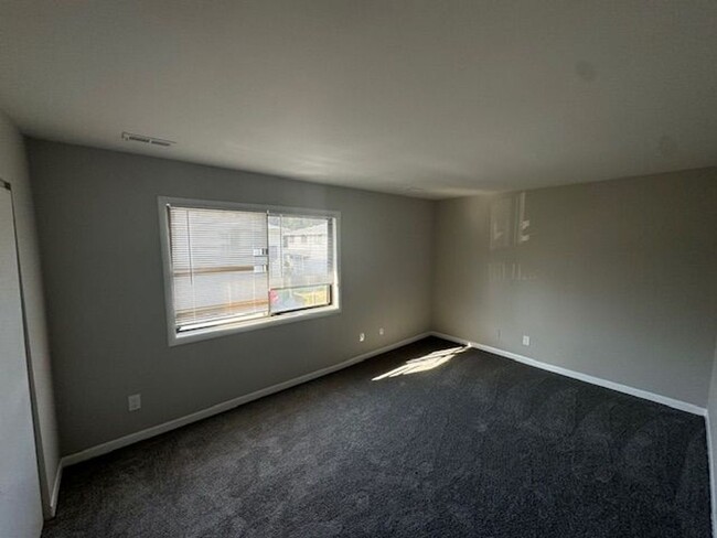 Building Photo - Cozy and Convenient 2-Bedroom Condo