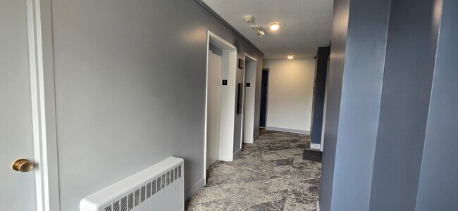 Building Photo - Everything is new! Harvard Sq! Walk to T! Large 1bd with balcony! Parking included!