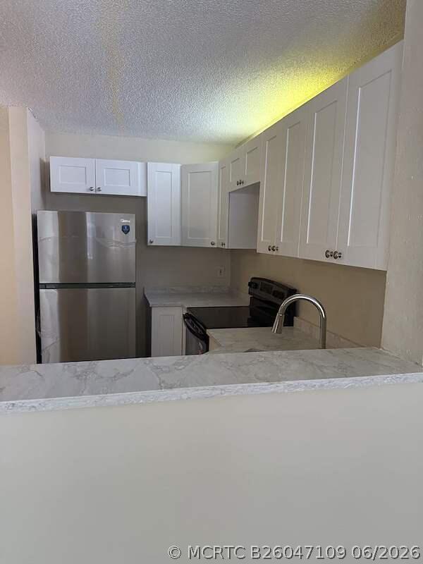 Building Photo - 10914 Royal Palm Blvd