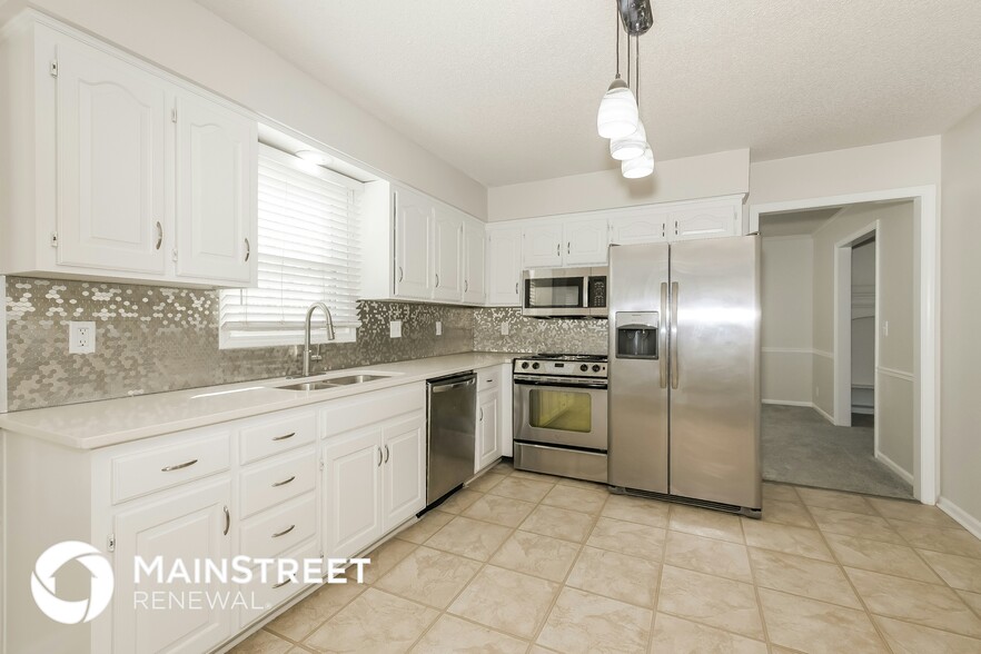 Building Photo - 7821 Woodstone Ln