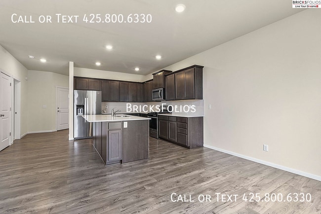 Building Photo - Your Dream Home Awaits in Puyallup – Bonus Offer Included!