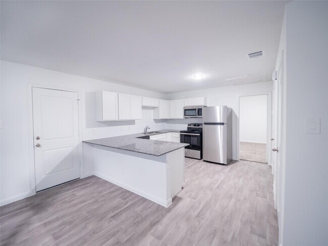 Building Photo - 16331 Jasmine Marie Pl