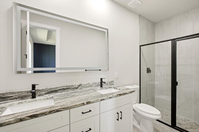 Building Photo - New 3/2 Pool Home for Rent on Canal, Fenced Yard, Pets Welcome. Your Dog Approves of This Backyard