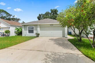 Building Photo - 7323 Lawn Tennis Ln