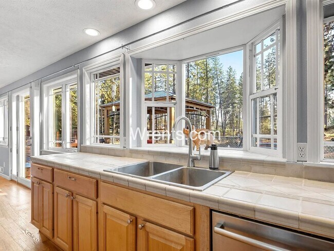 Building Photo - 3200 sq ft 3BR/3BA Home in Latah Valley – Bonus Shop Available