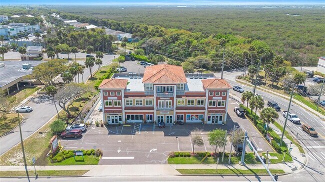 Building Photo - 701 E 3rd Ave