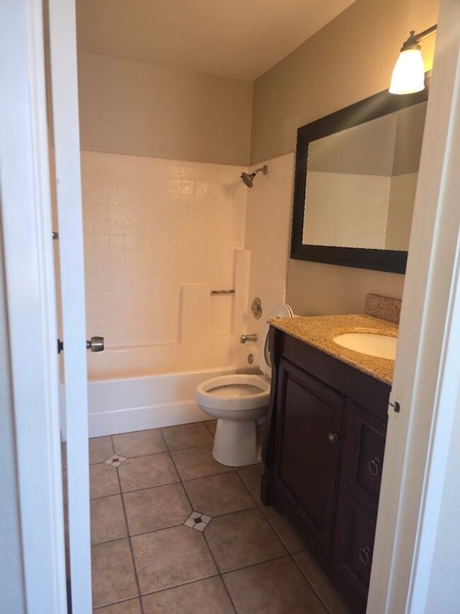Building Photo - Light-Filled End Unit Condo, 2BD/2.5BA wit...