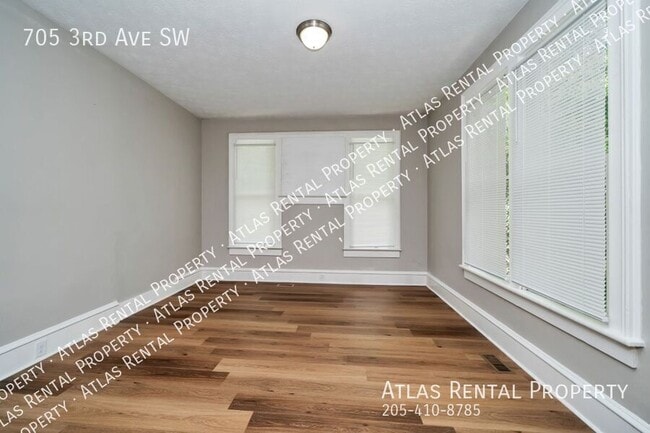 Building Photo - 705 3rd Ave SW