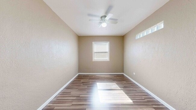 Building Photo - 3 bed 2 bath home with a carport in backyard