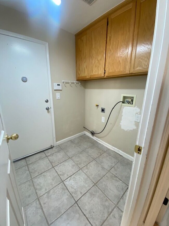 Building Photo - Spacious 5-Bedroom Home with Solar, Stunning Sunroom & Upgraded Bathrooms!