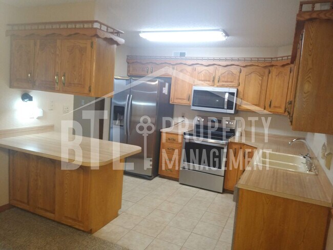 Building Photo - Condo by Lake with RV Spot!! 55+ Community
