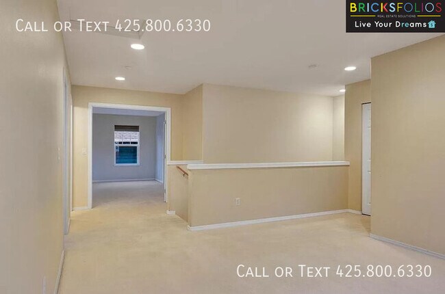 Building Photo - Dream Kitchen, Dual Fireplaces: Find Your Stylish Sanctuary in Redmond Ridge.