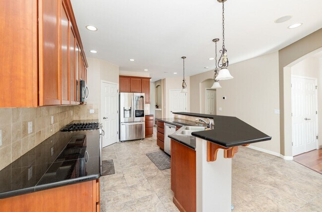 Building Photo - Stylishly updated 4 BedroHome in Park at C...