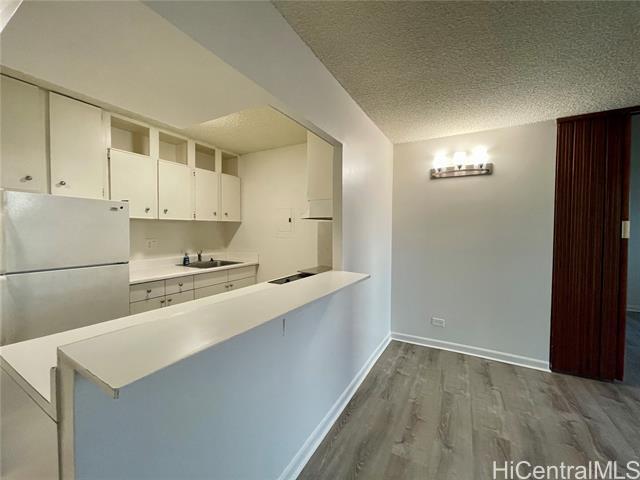 Building Photo - 98-1038-1038 Moanalua Rd