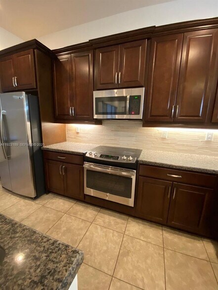 Building Photo - 9823 W 34th Ln