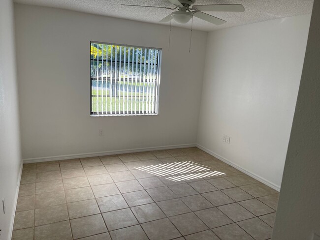 Building Photo - READY TO MOVE INTO 3/2/2 WITH IDEAL LOCATI...