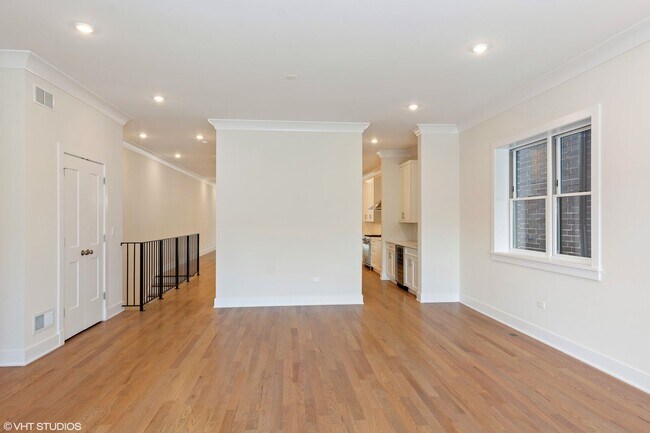 Building Photo - Condo Quality 3,400 SF Duplex Down in Roscoe Village, Pet Friendly Available August 1st