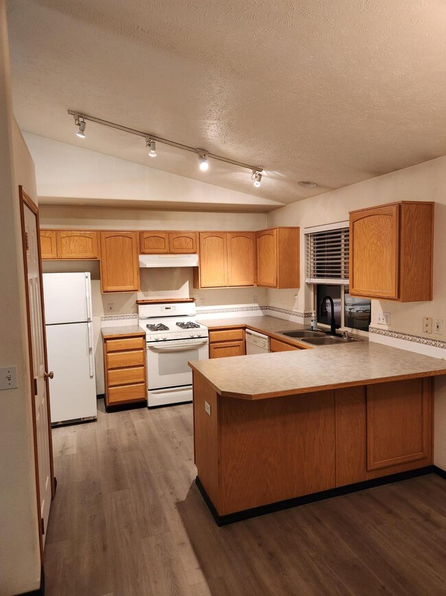 Kitchen and open dining room - 7202 N Helena St